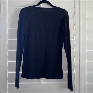Like new Lululemon black shirt.  Pima cotton with Lycra.